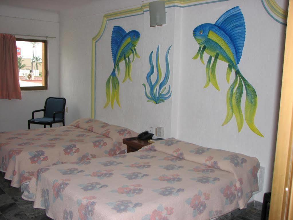 Hotel Y Suites Plaza Manzanillo Bagian luar foto